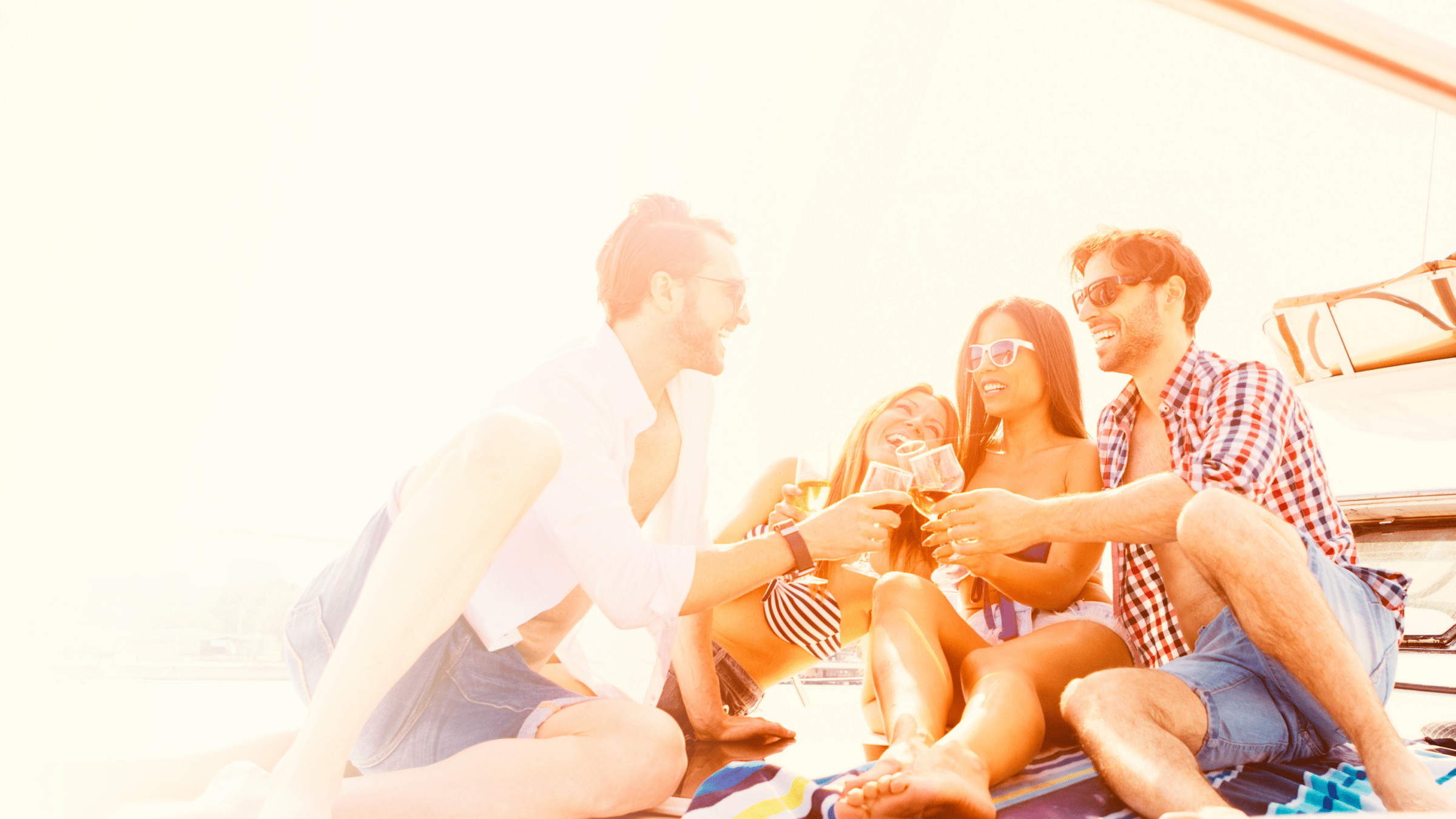 Friends celebrating on a private yacht