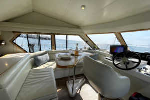 Indoor dining area aboard the Lady M private charter yacht