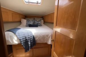Guest cabin with sleeping accommodations aboard the Lady M yacht