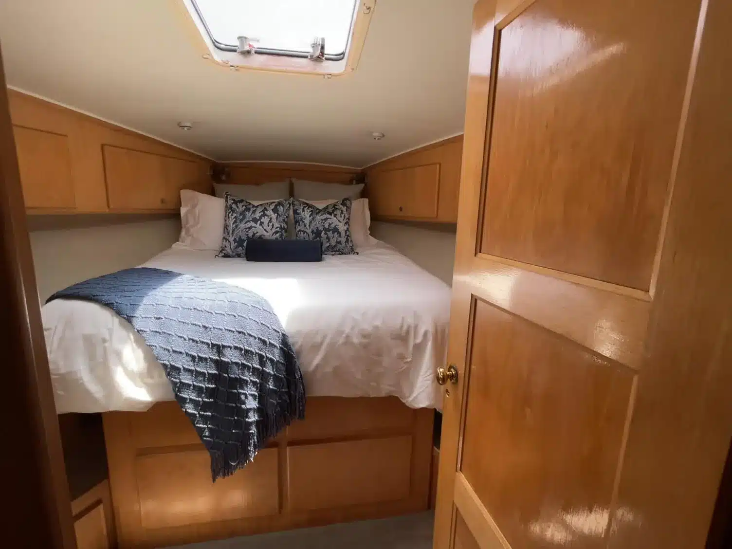 Guest cabin with sleeping accommodations aboard the Lady M yacht