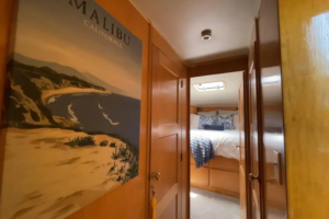 Interior hallway connecting the living spaces aboard Lady M