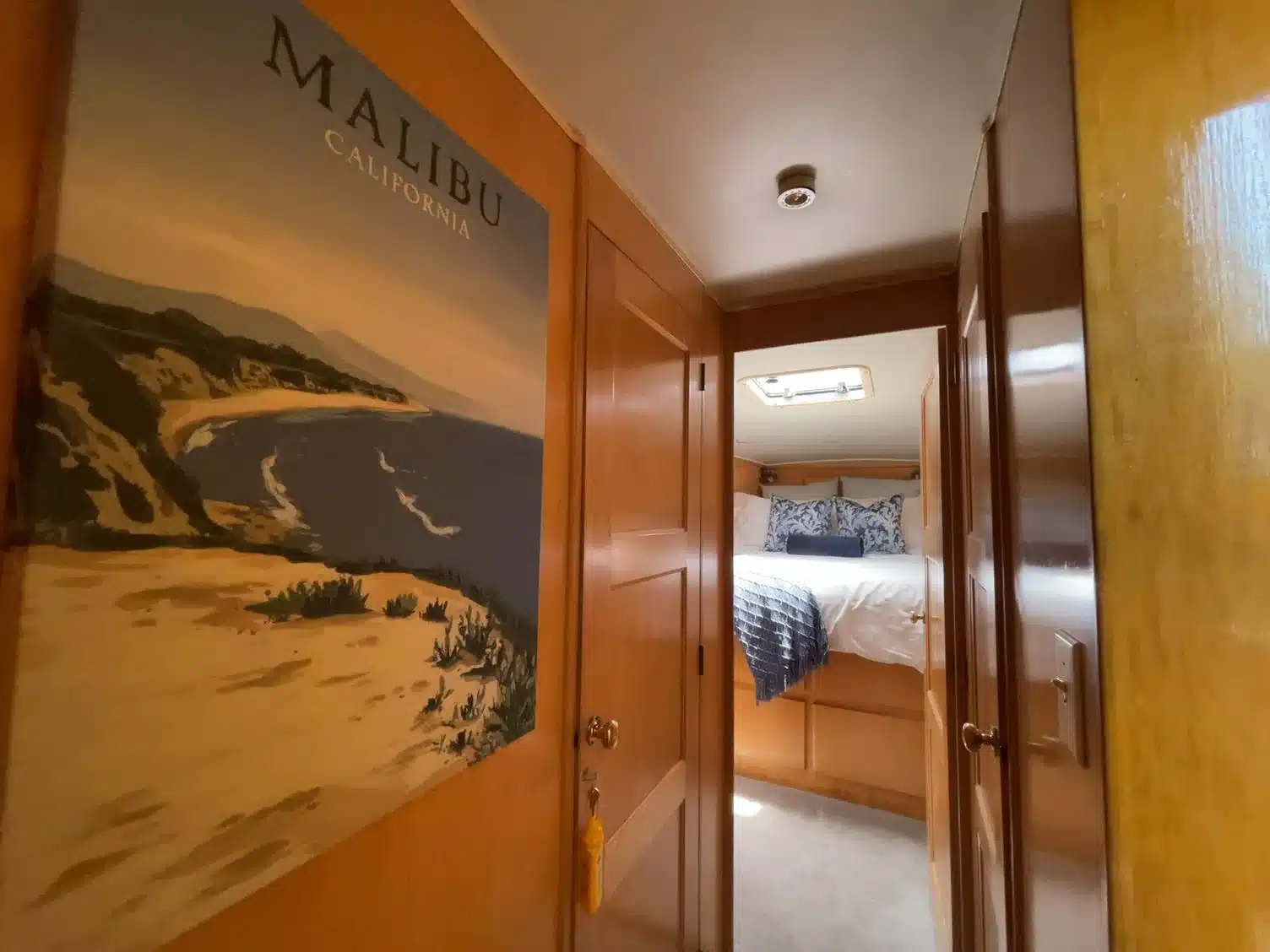 Interior hallway connecting the living spaces aboard Lady M