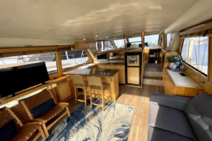 Main salon and indoor lounge seating aboard the Lady M yacht