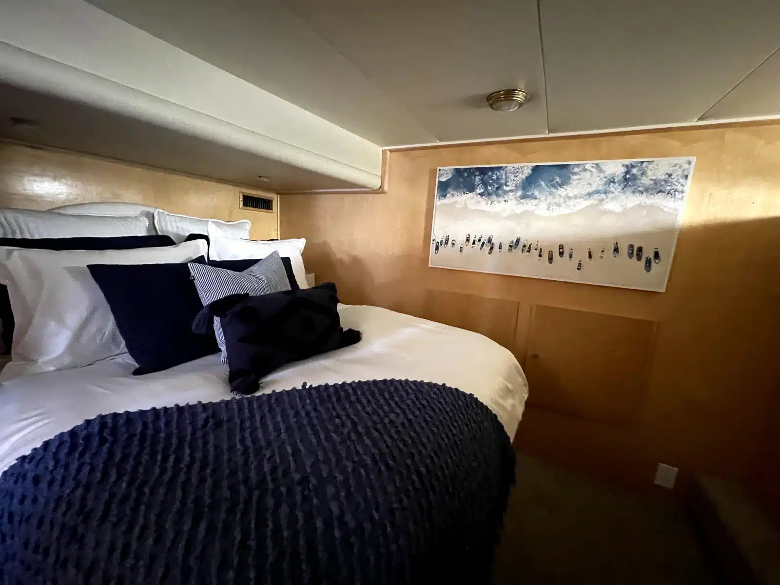 Primary bedroom with sleeping accommodations aboard Lady M